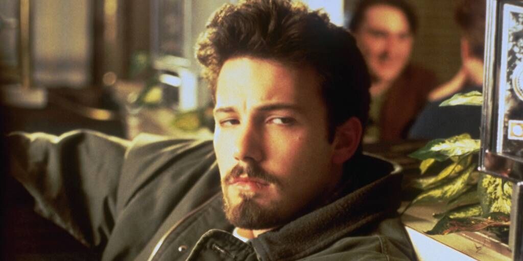 Ben Affleck as Holden sitting in a diner in Chasing Amy