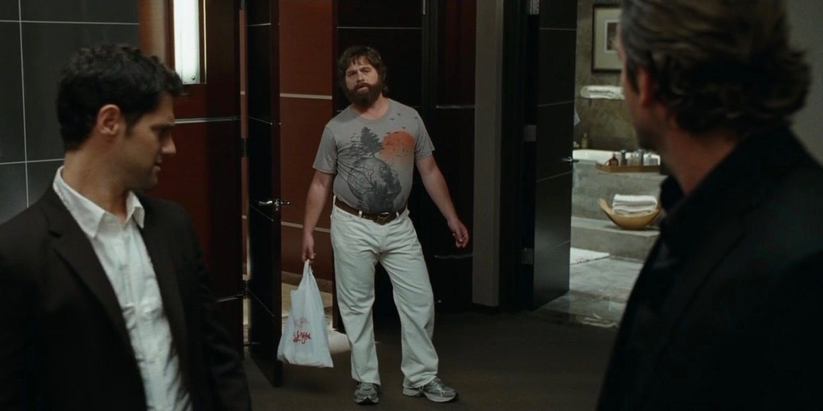 Justin Bartha Zach Galifanakis and Bradley Cooper in The Hangover 1