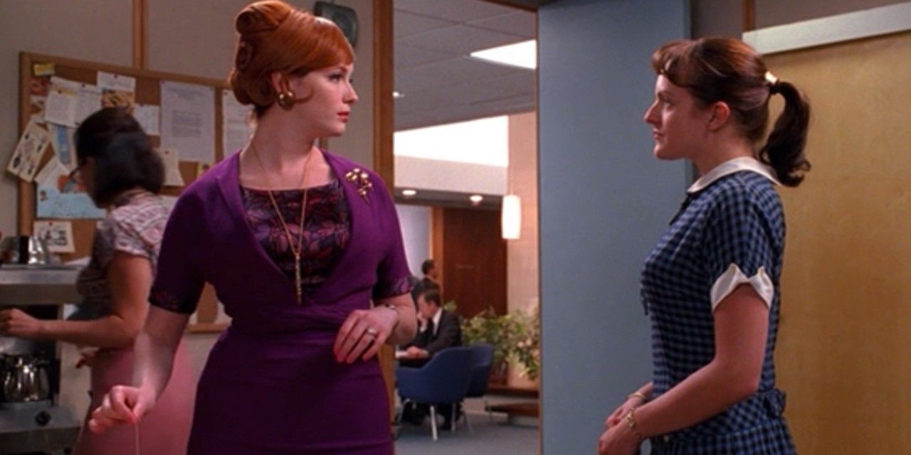Christina Hendricks as Joan and Elisabeth Moss as Peggy in Mad Men