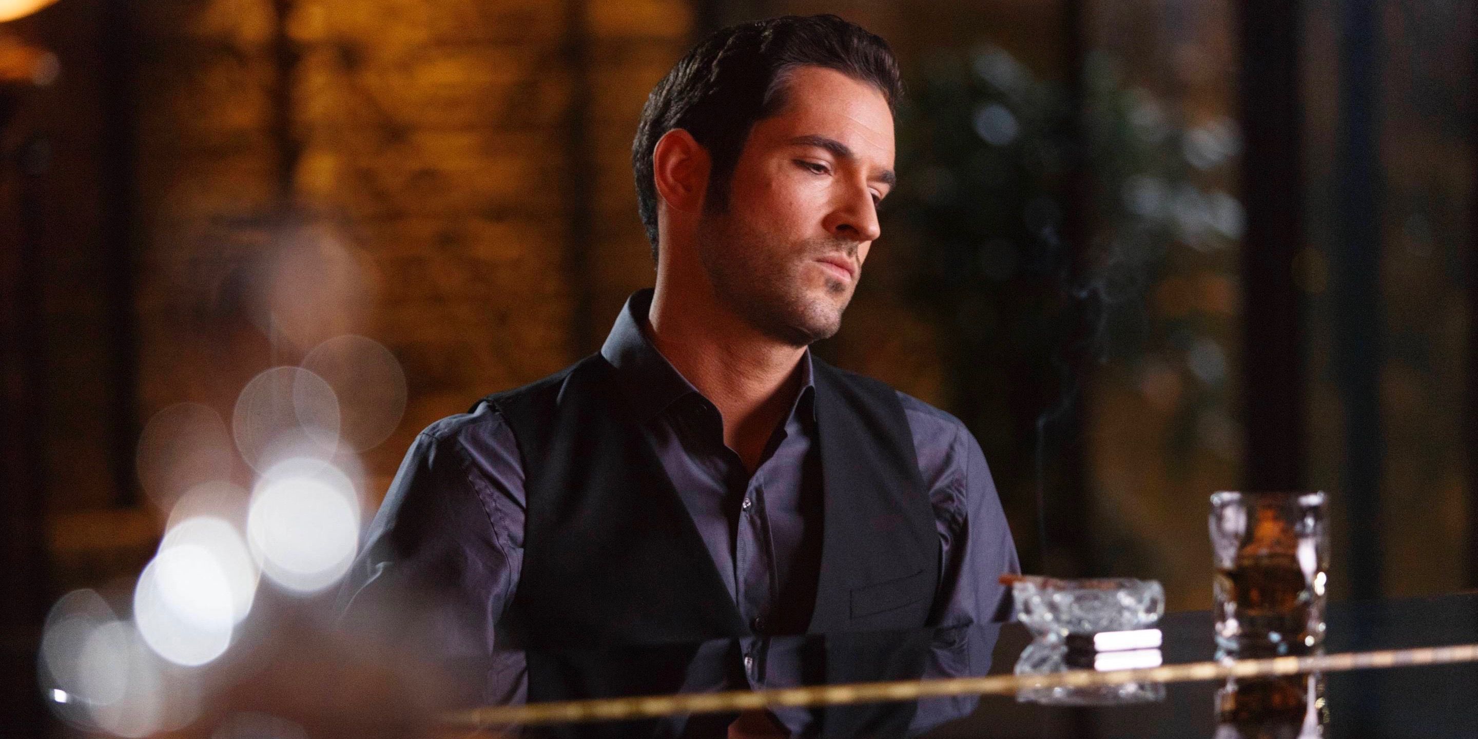 Lucifer Morningstar sitting at his piano in Lucifer