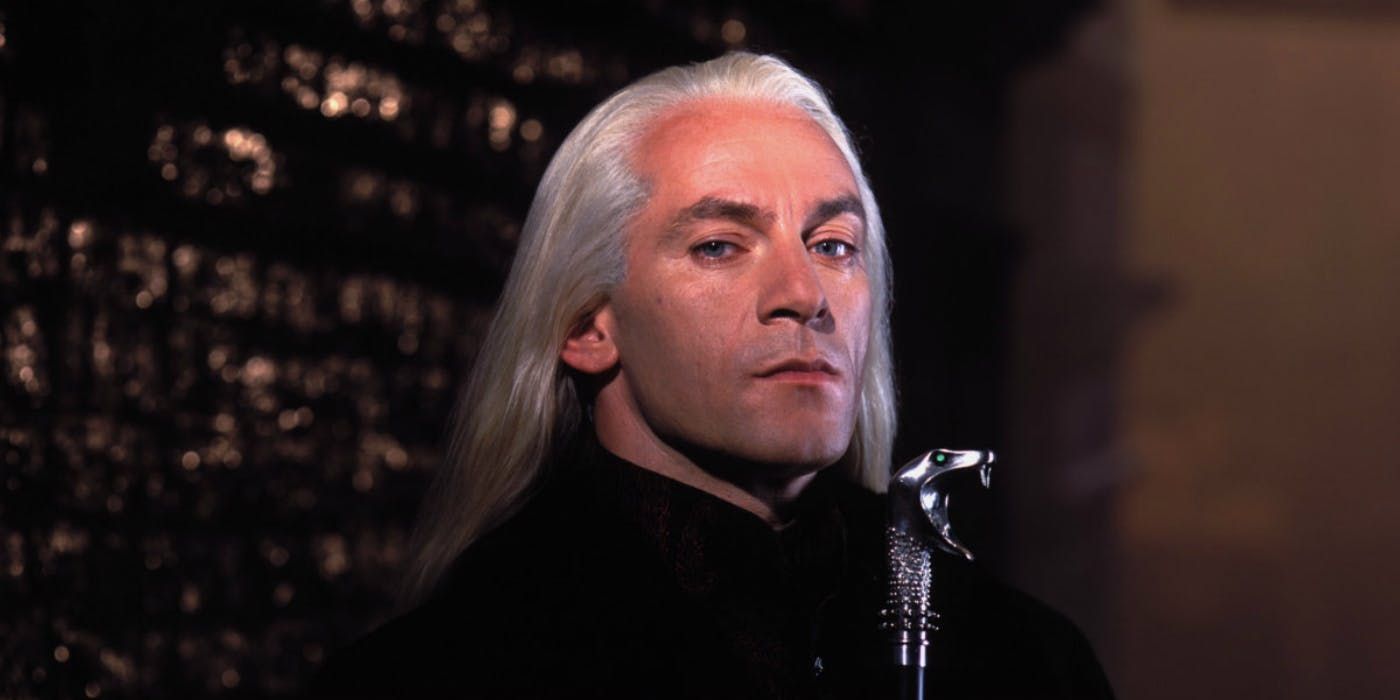 Lucius Malfoy holding his cane in Harry Potter