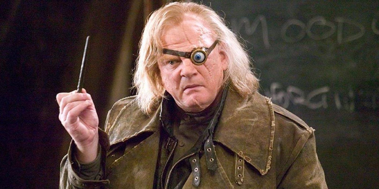 Mad-Eye Moody holding a wand.