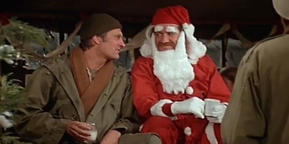 Hawkeye talking to a man dressed as Santa
