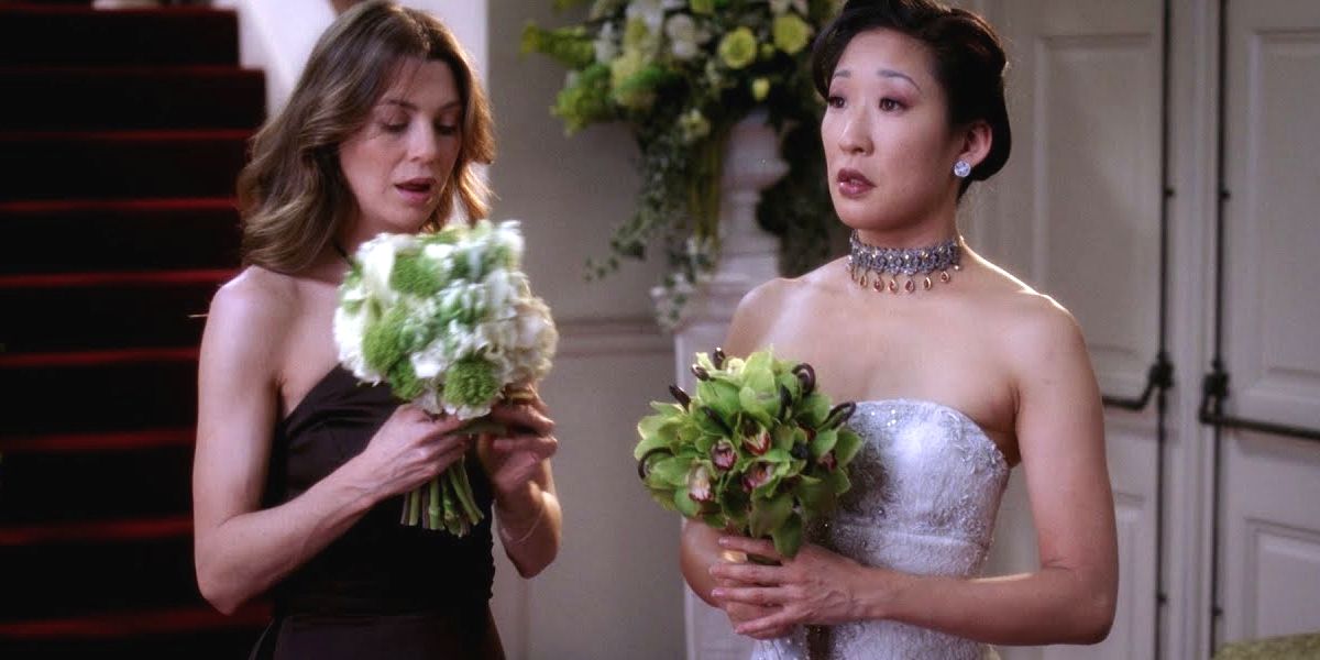 An image of Meredith and Cristina standing in the church foyer in Grey's Anatomy