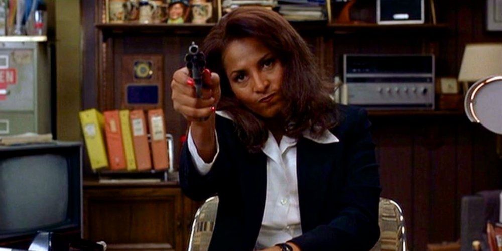 Pam Grier holding a gun in Jackie Brown