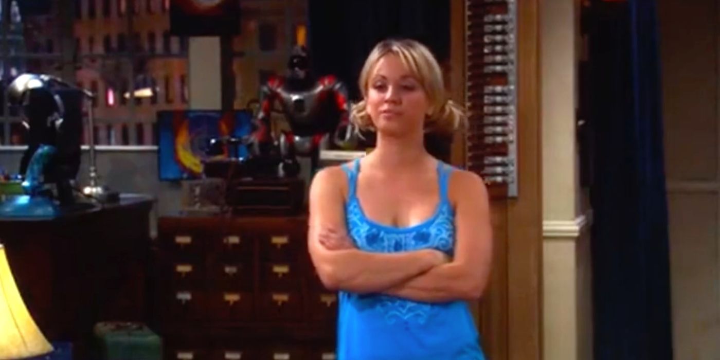 Penny standing with her arms crossed in The Big Bang Theory