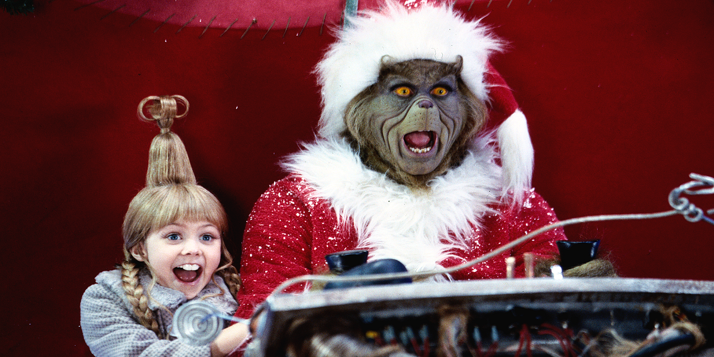 Grinch และ Cindy Lou กรีดร้องขณะเลื่อนหิมะใน How the Grinch Stole Christmas