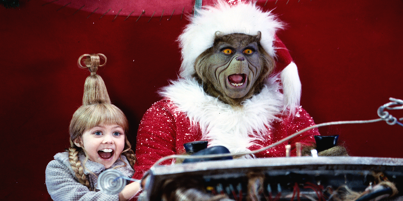 O Grinch e Cindy Lou gritando no trenó em How the Grinch Stole Christmas