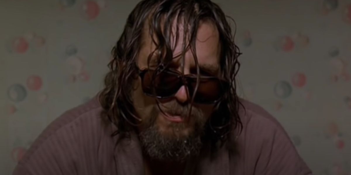 The Dude sitting on the toilet looking bedraggled in The Big Lebowski