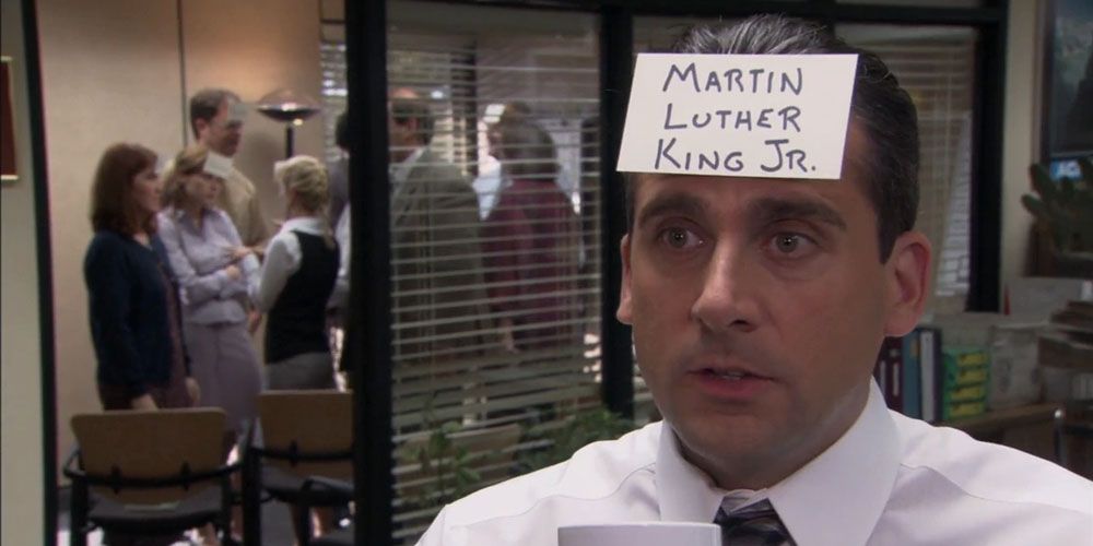 Michael Scott with a notecard on his forehead on The Office