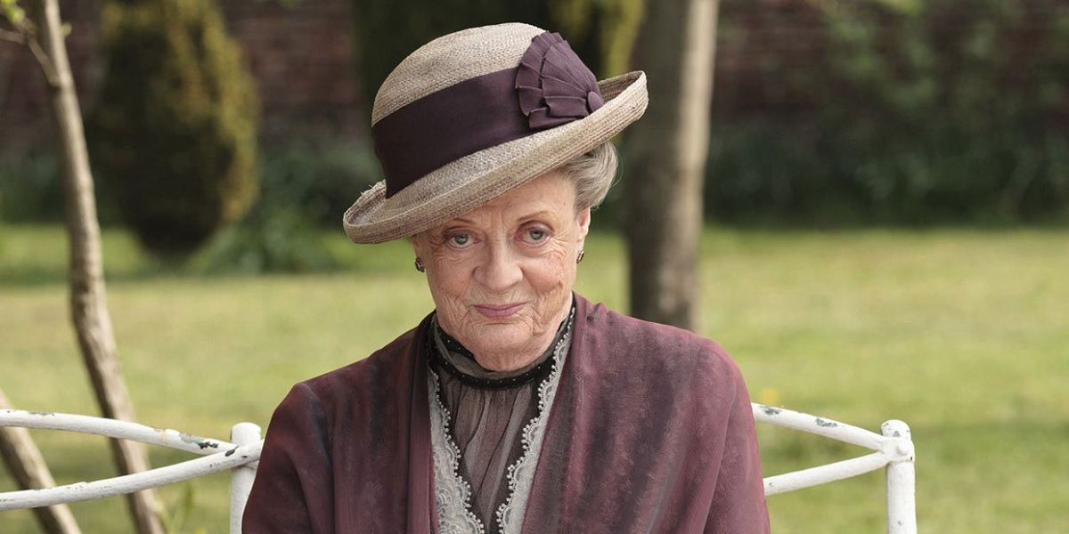 Violet Crawley sitting in the garden in Downton Abbey