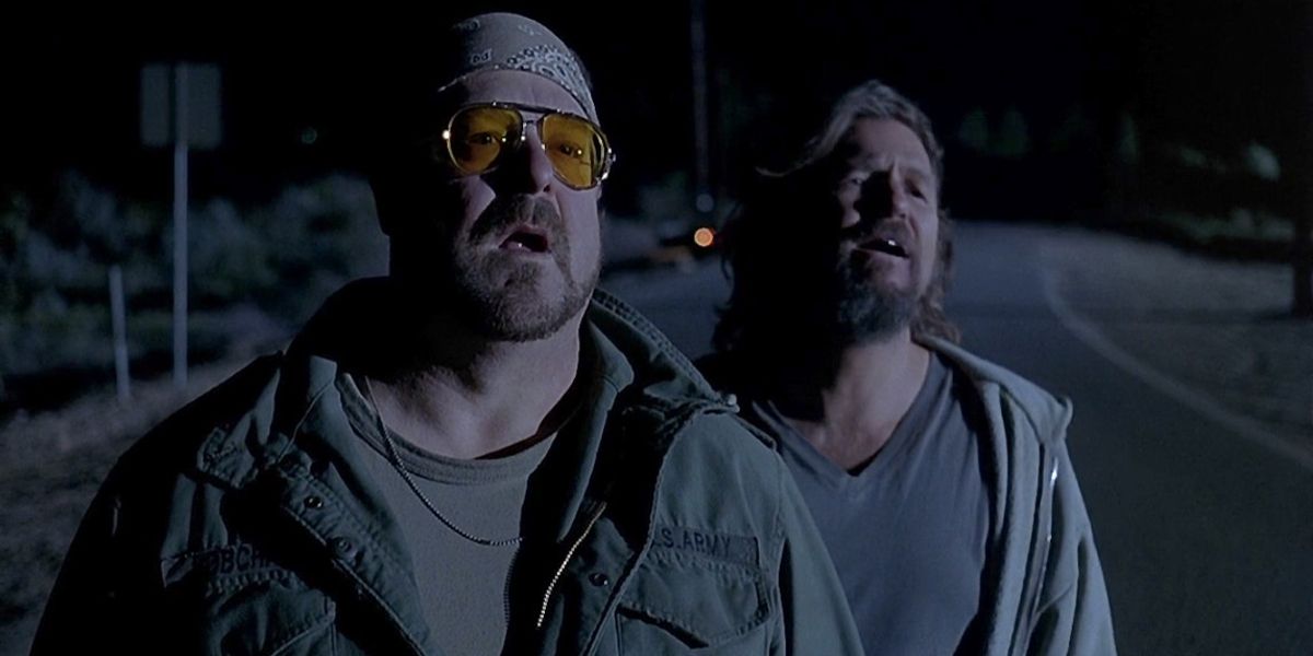 Walter and The Dude looking shocked in the middle of a dark road in The Big Lebowski
