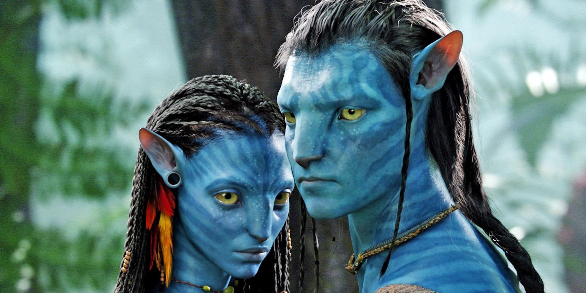 Zoe Saldana as Neytiri and Sam Worthington as Jake Sully in Avatar