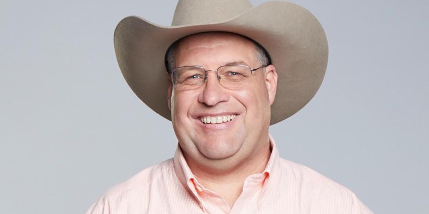 Cliff Hoff wears a cowboy hat and grins for a Big Brother 21 promo image