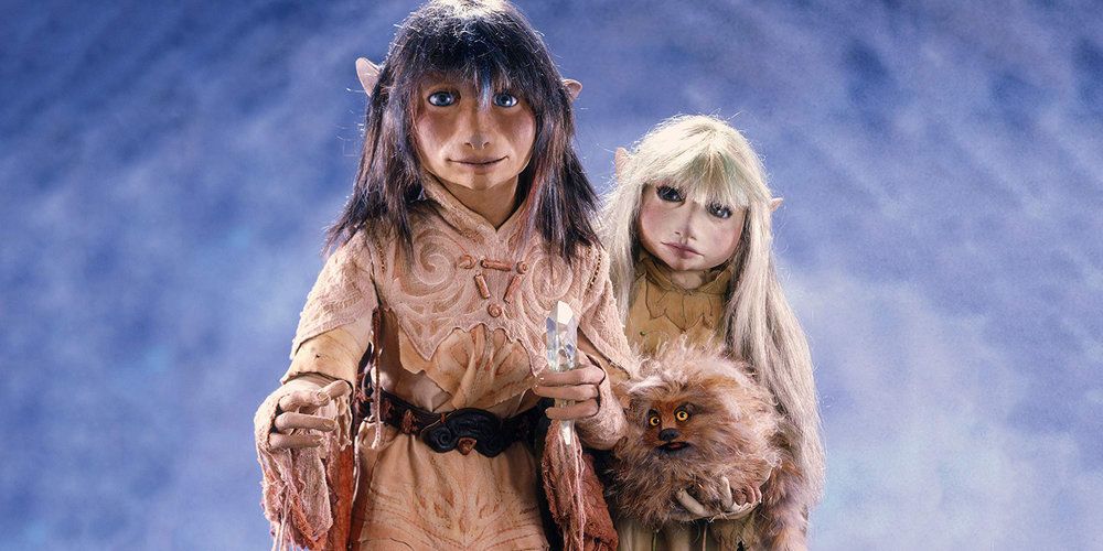 Jen and Kira holding FIzzgig in the original Dark Crystal.