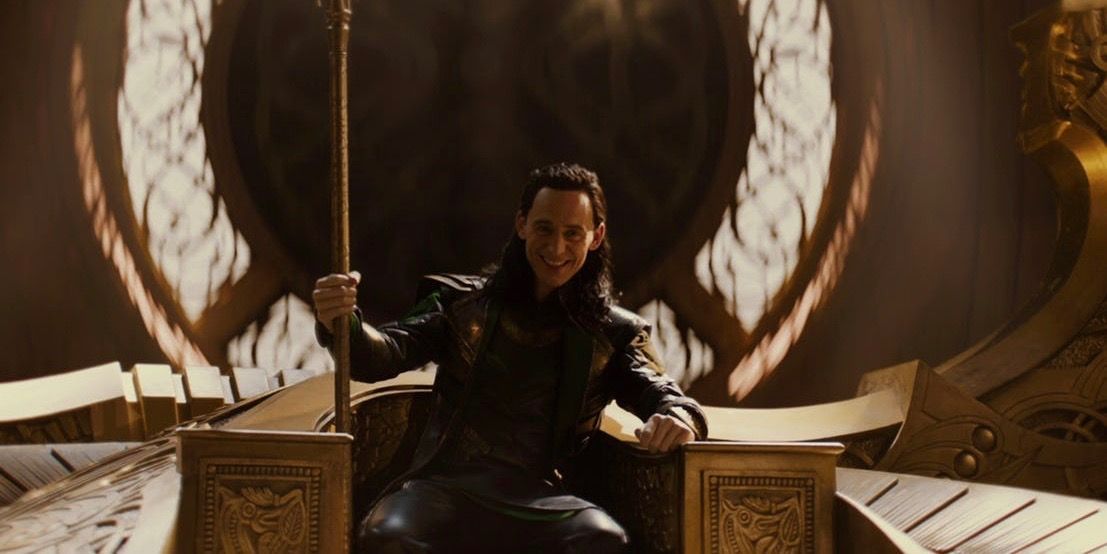 Loki sits on the Asgardian throne and smiles