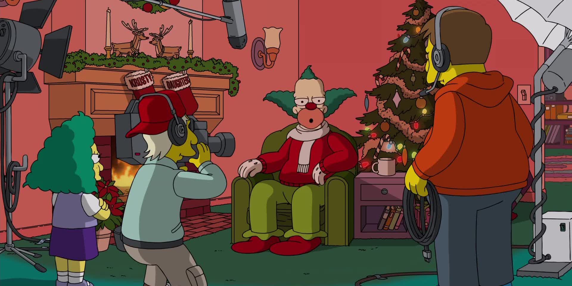 Krusty sitting in a chair beside the Christmas tree in The Simpsons