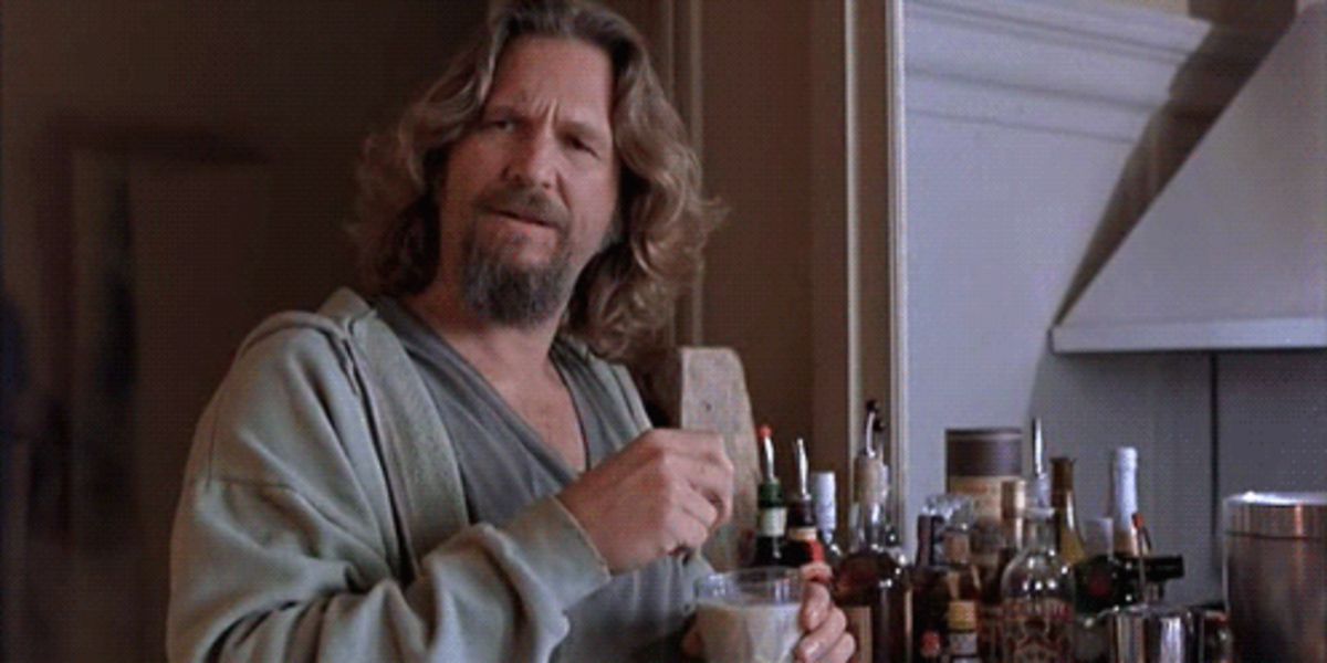 The Dude mixing himself a drink in Maude's apartment in The Big Lebowski