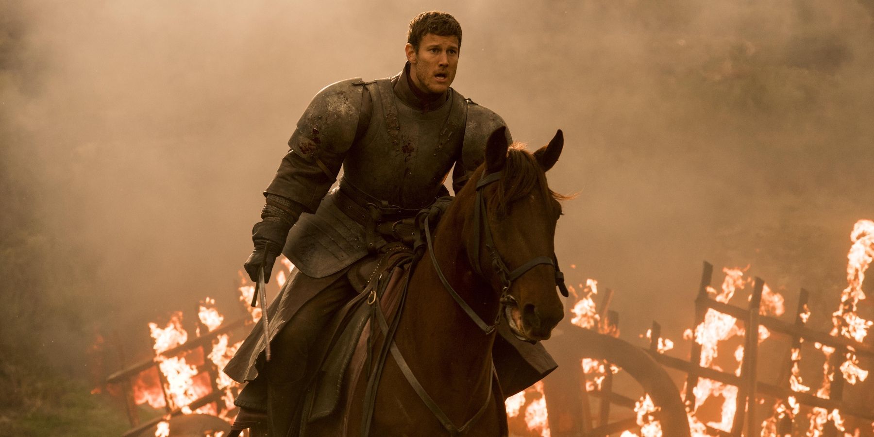 Tom Hopper, as Dickon Tarly, rides a horse in Game of Thrones