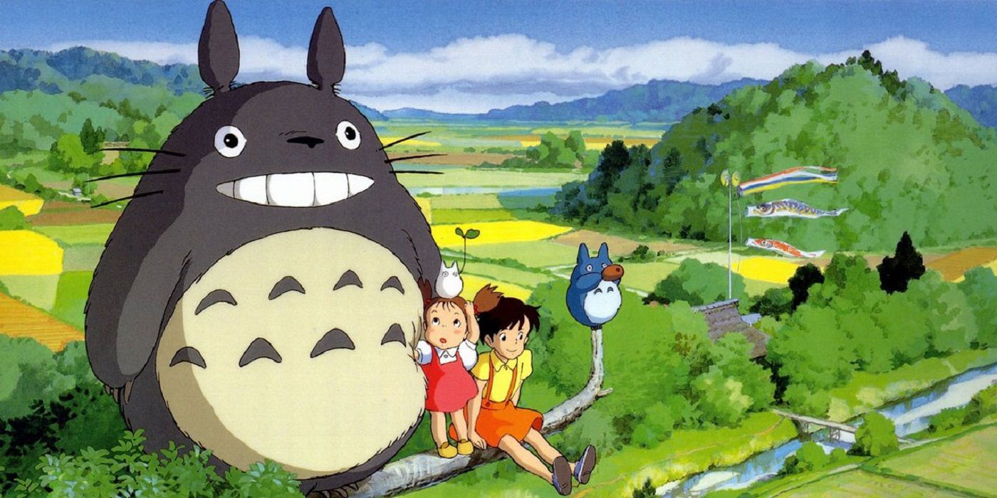 Totoro in the trees with Mei and Satsuki in My Neighbor Totoro