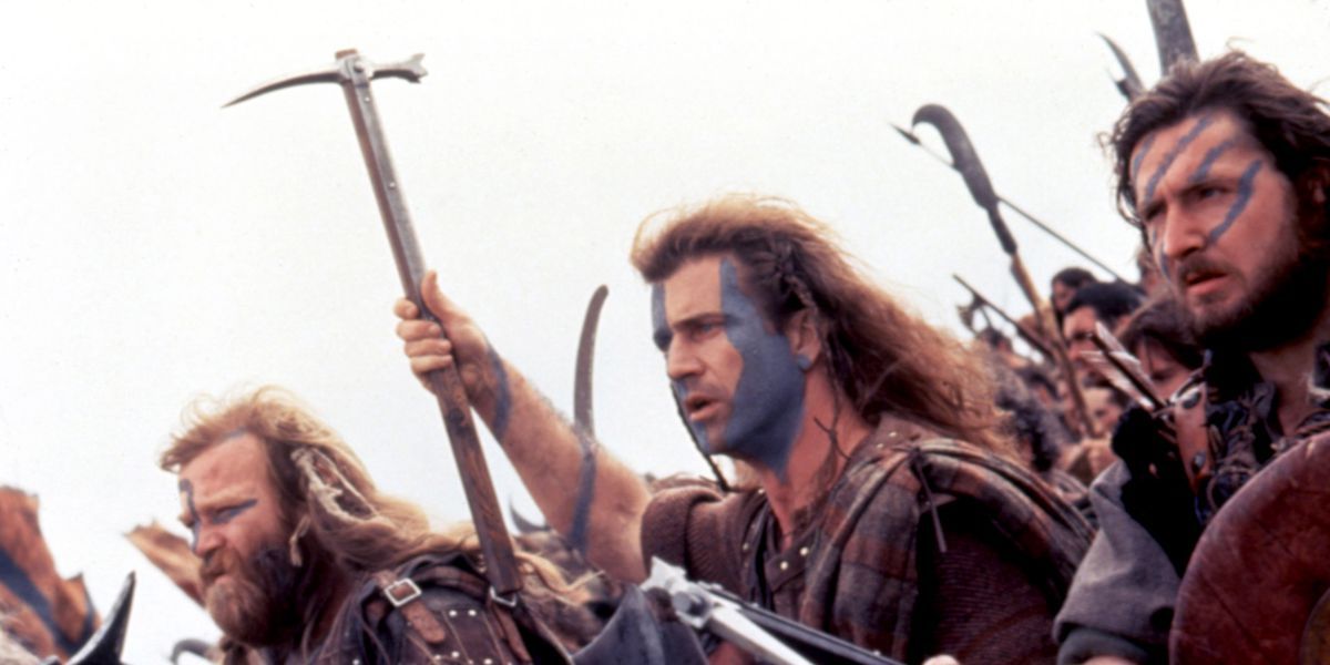 Mel Gibson as William Wallace leading other men into battle in Braveheart