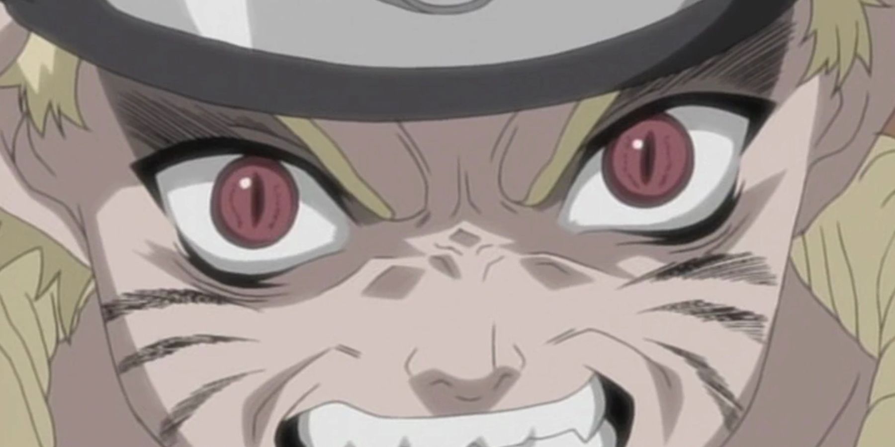 A closeup of Naruto as the seal breaks and the fox abilities emerge in episode 16 of Naruto