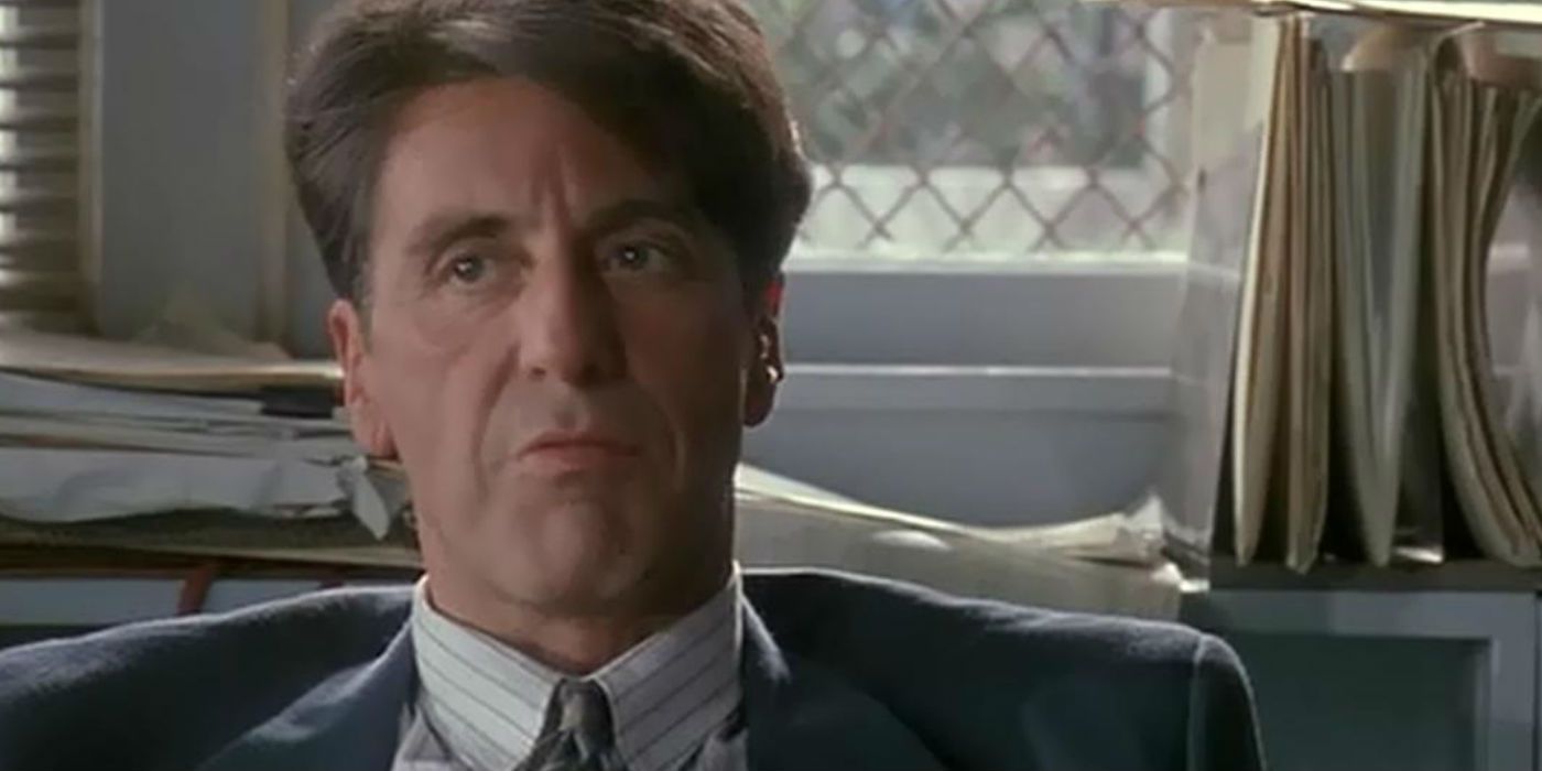 Al Pacino sitting at a desk in Glengarry Glen Ross.