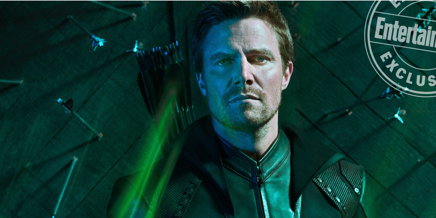 Oliver Queen stands in Arrow season 8 suit