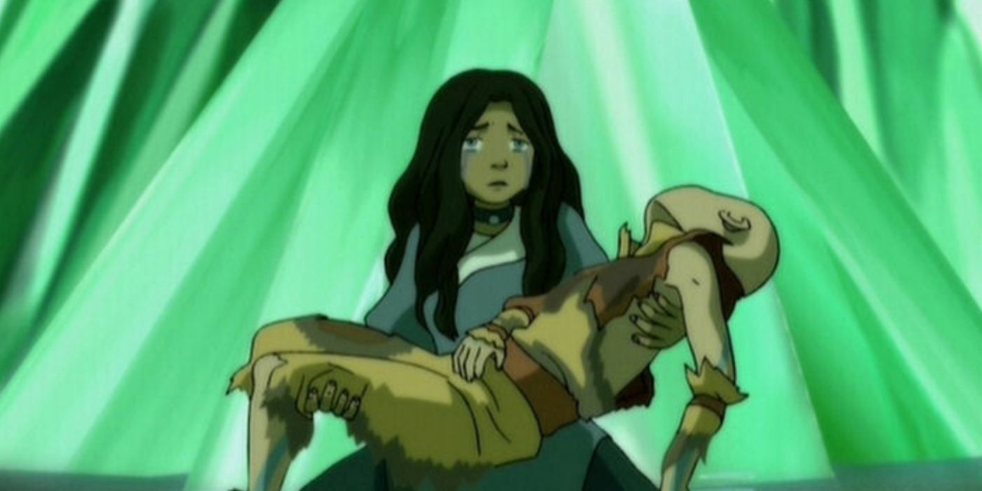 Katara holds Aang in The Crossroads of Destiny episode of Avatar The Last Airbender