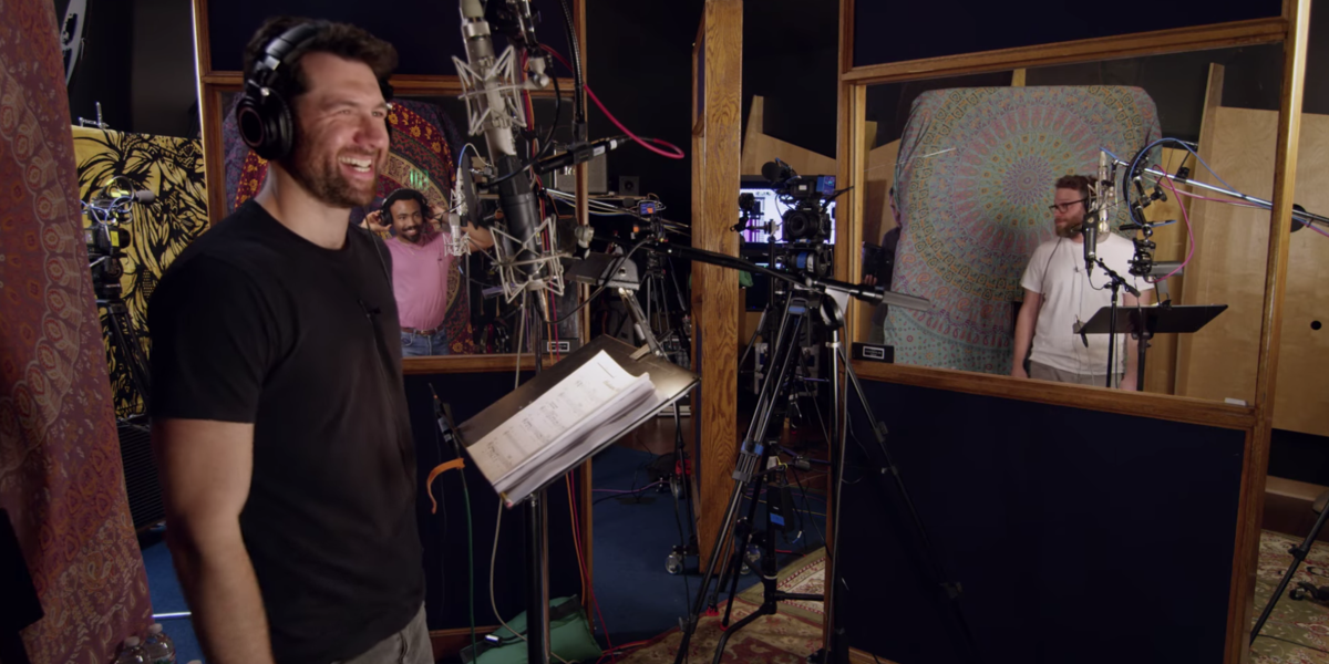 Billy Eichner laughing in the recording studio for The Lion King