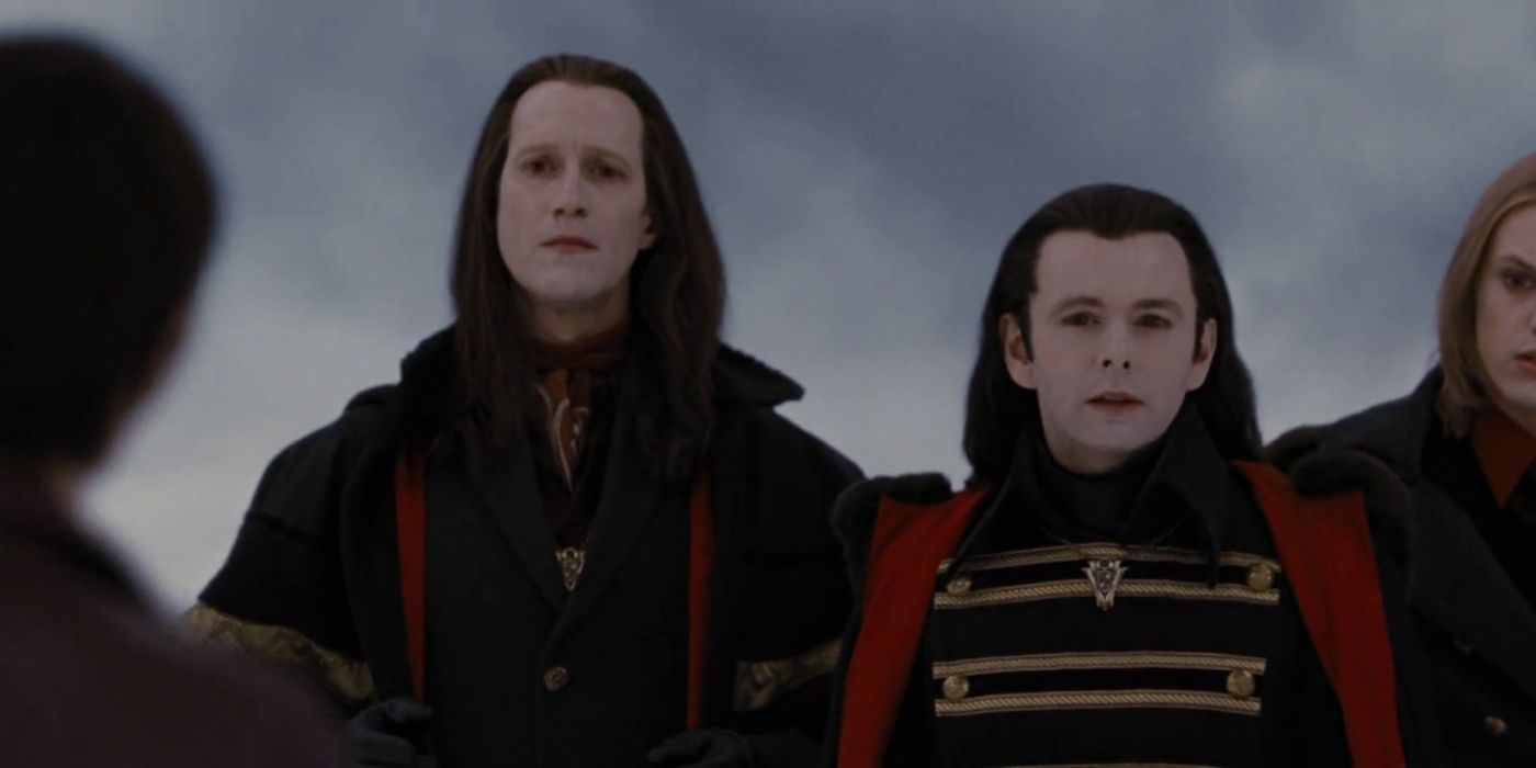 Marcus, Aro and Ciaus looking skeptically at Alice in Breaking Dawn Part 2