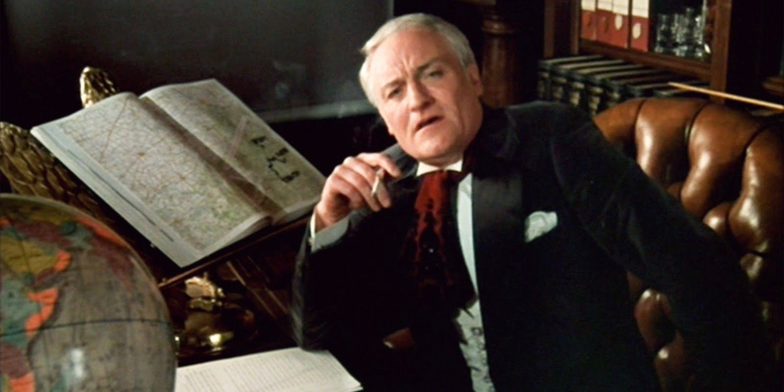 Charles Gray as the Criminologist in The Rocky Horror Picture Show