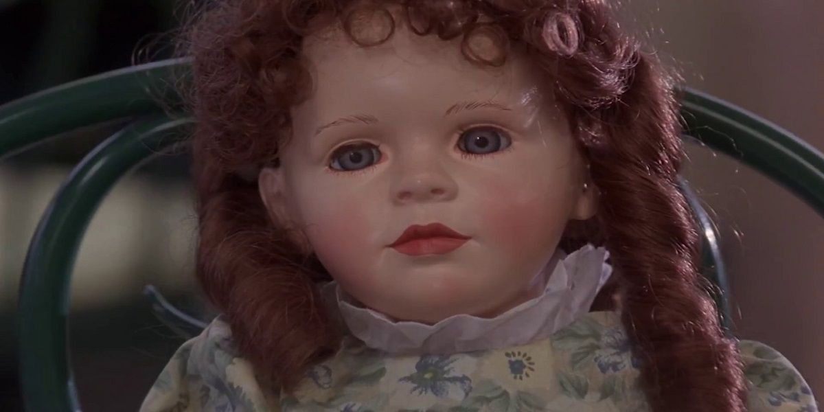Chinga the doll sits in a chair in The X-Files