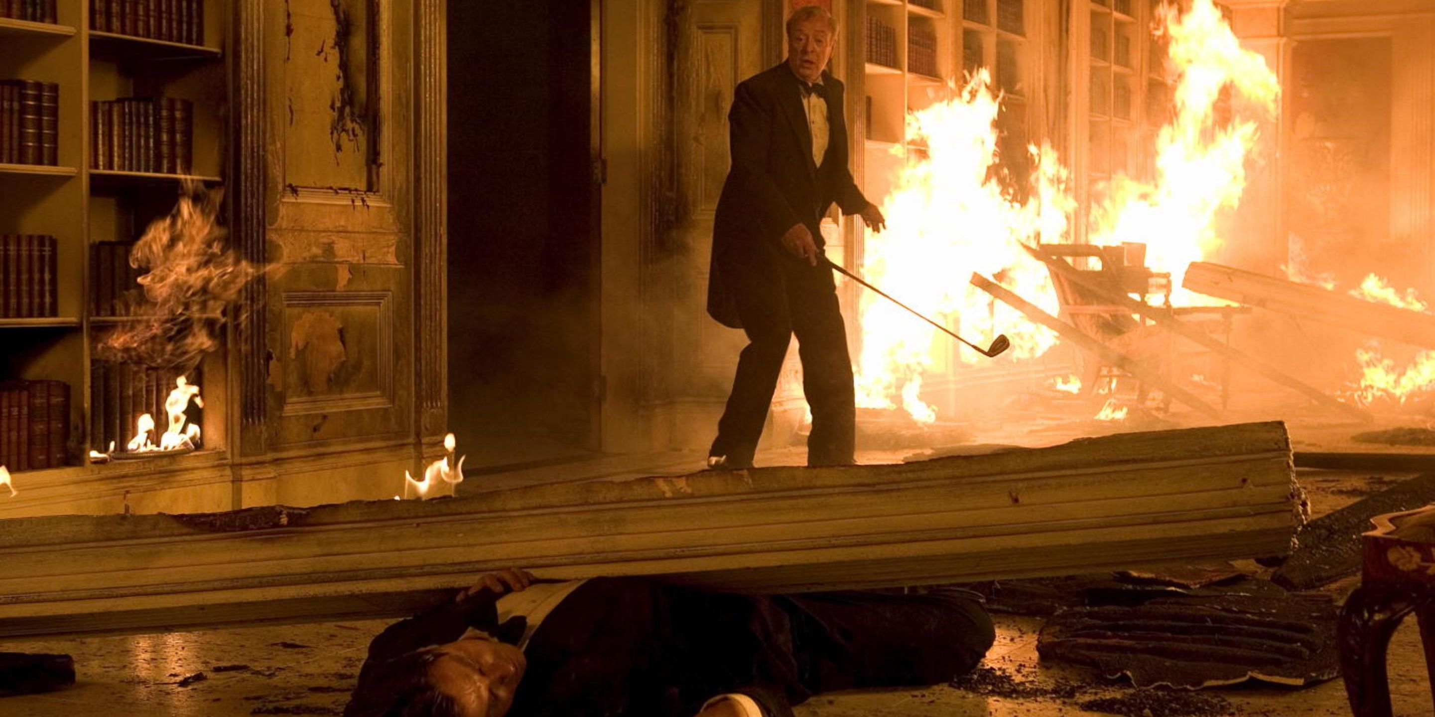 Christian Bale as Bruce Wayne and Michael Caine as Alfred in Batman Begins