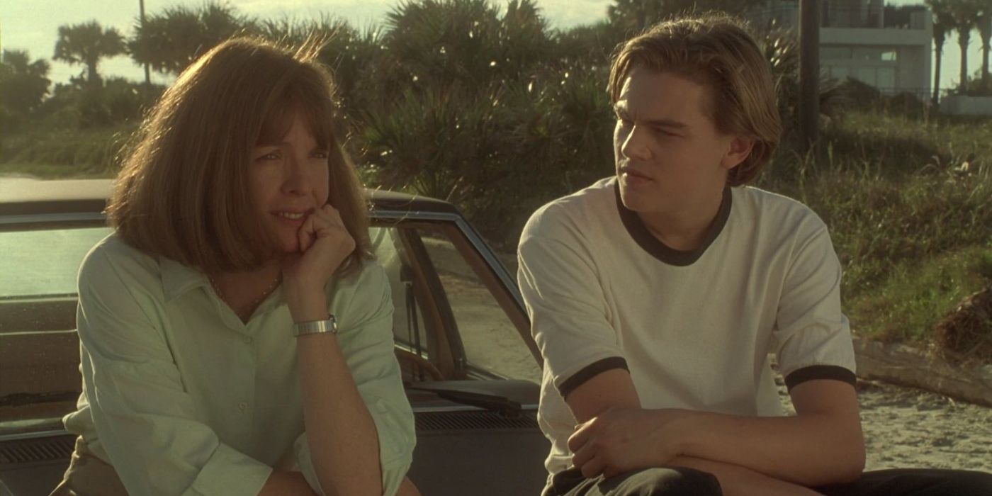 Leonardo DiCaprio sits on the hood of a car with Diane Keaton in Marvin's Room