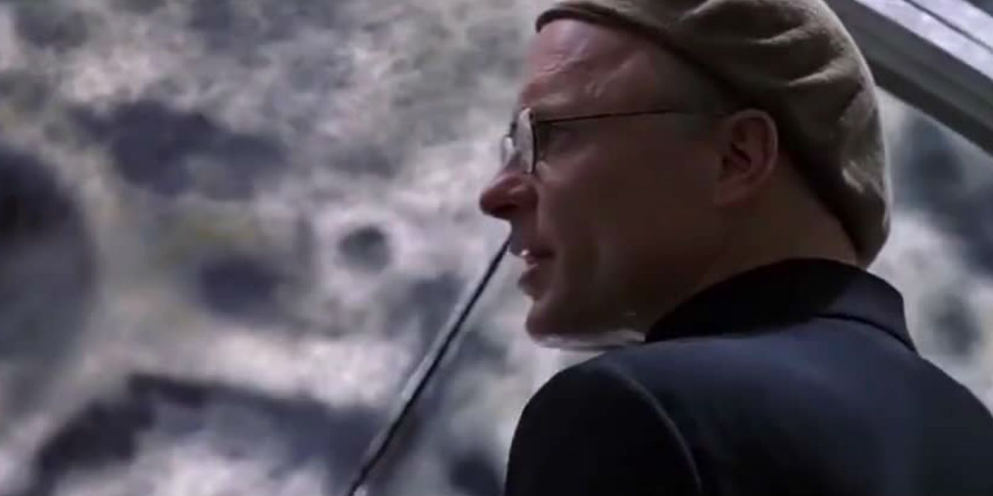 Ed Harris as Cristof looks off to the side in a scene from The Truman Show.