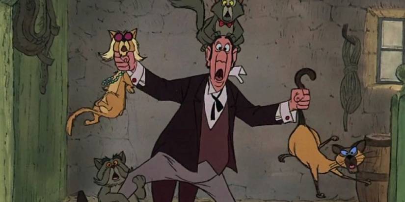 Edgar-Balthazar holding several cats in Aristocat