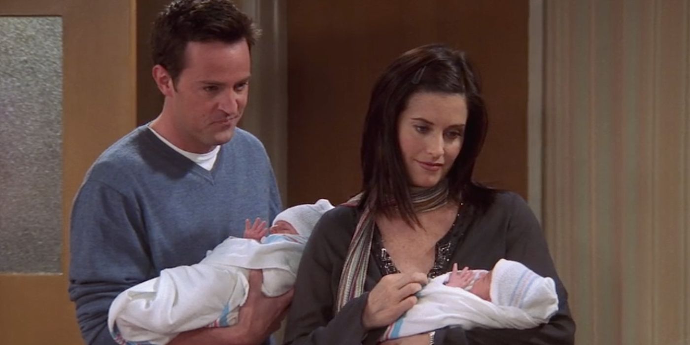 Chandler and Monica with their twin babies in Friends.