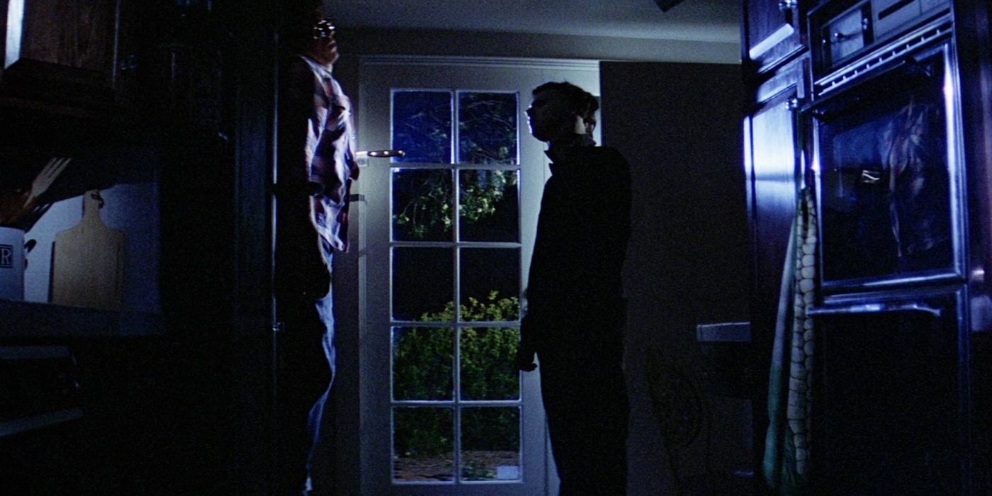 Michael Myers waiting in the dark in Halloween