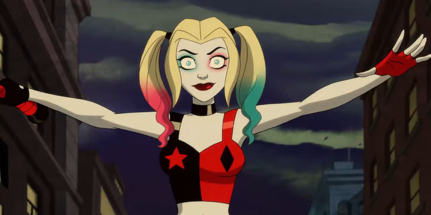 Harley Quinn holds her arms out on the streets of Gotham in the animated show.