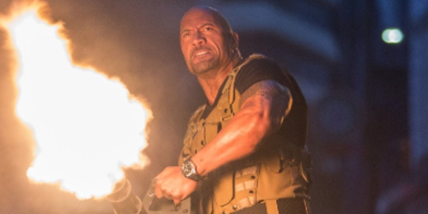 Hobbs fires a gatling gun in Furious 7