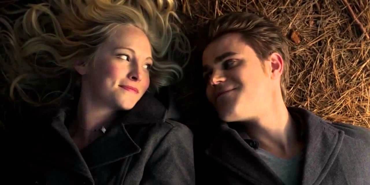 Caroline and Stefan smiling at each other in The Vampire Diaries