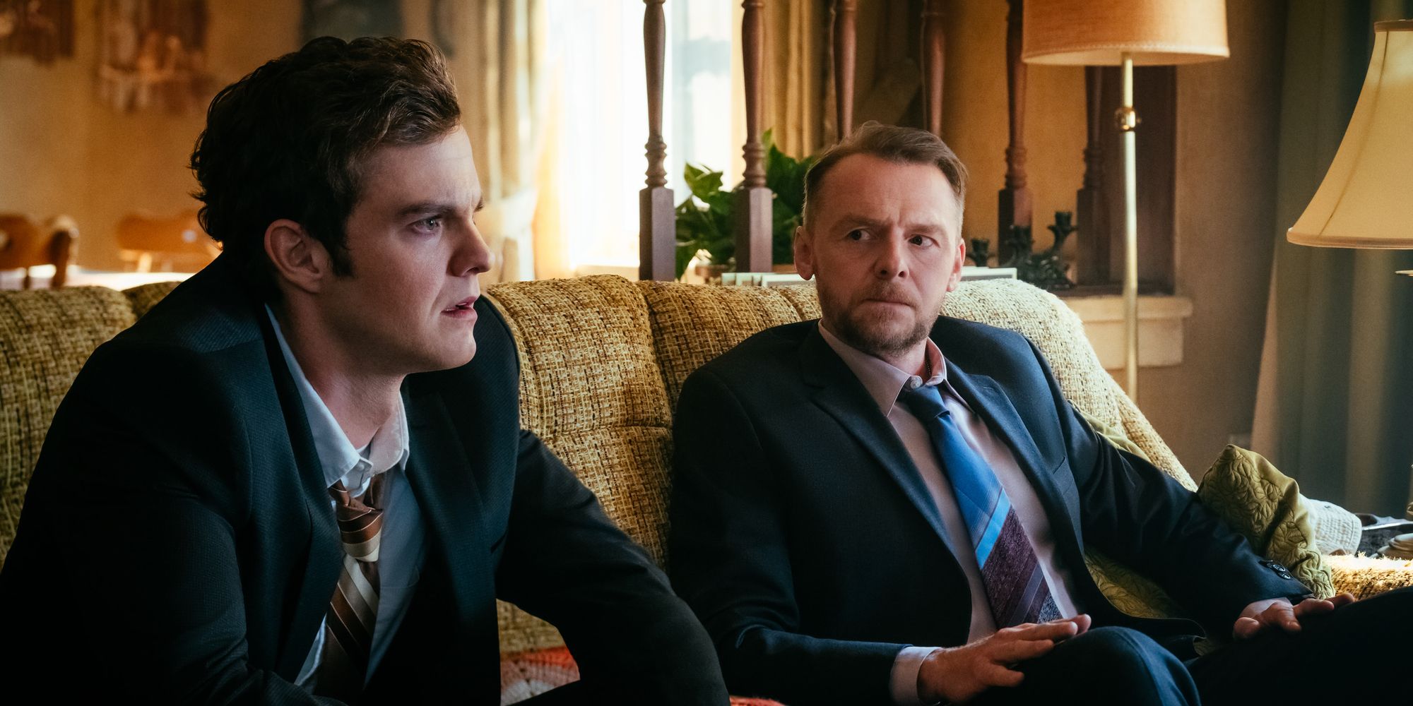 Jack Quaid and Simon Pegg in The Boys after funeral