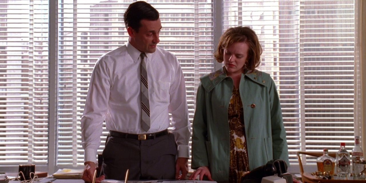 Jon Hamm as Don and Elisabeth Moss as Peggy in Mad Men