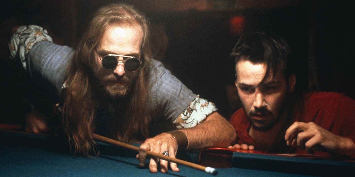 Harlan James (William Hurt) showing his cousin (Keanu Reeves) how to play pool in I Love You To Death