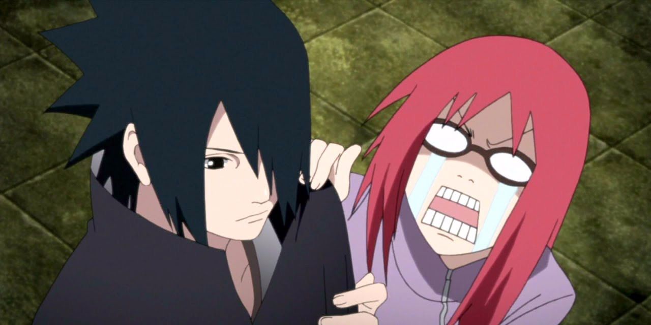 Karin clings to Sasuke while she cries in Naruto