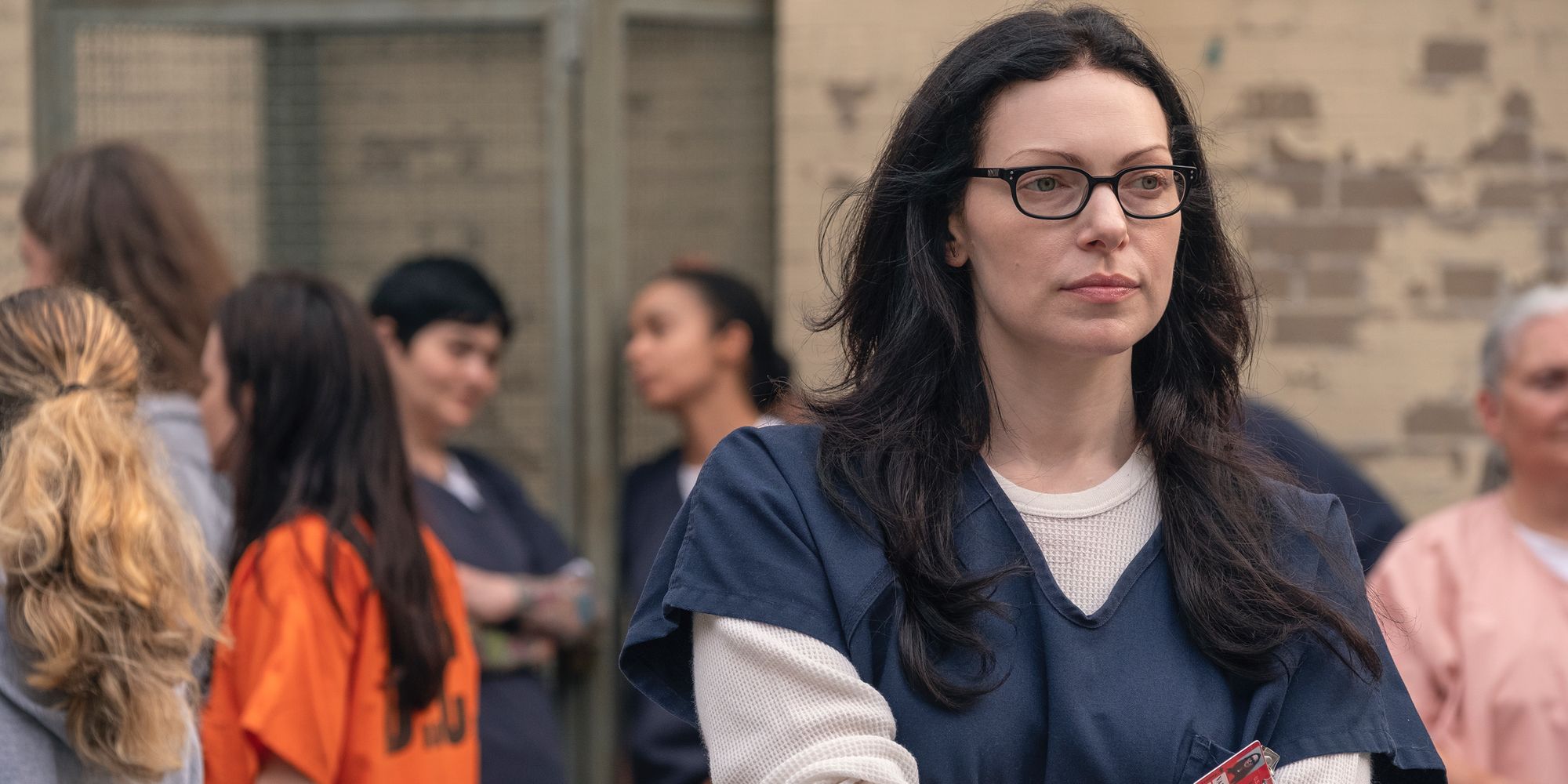 Alex with her arms crossed in OITNB