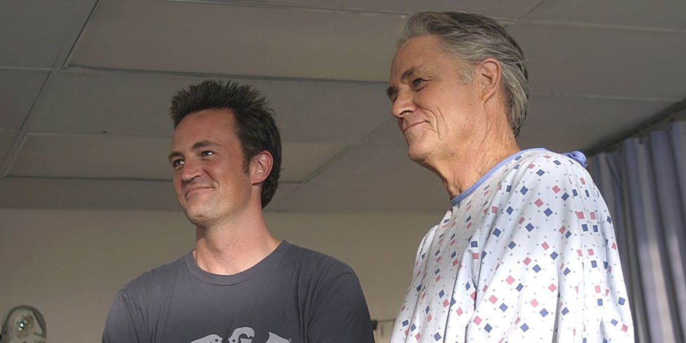 Murray Marks standing next to his father in Scrubs