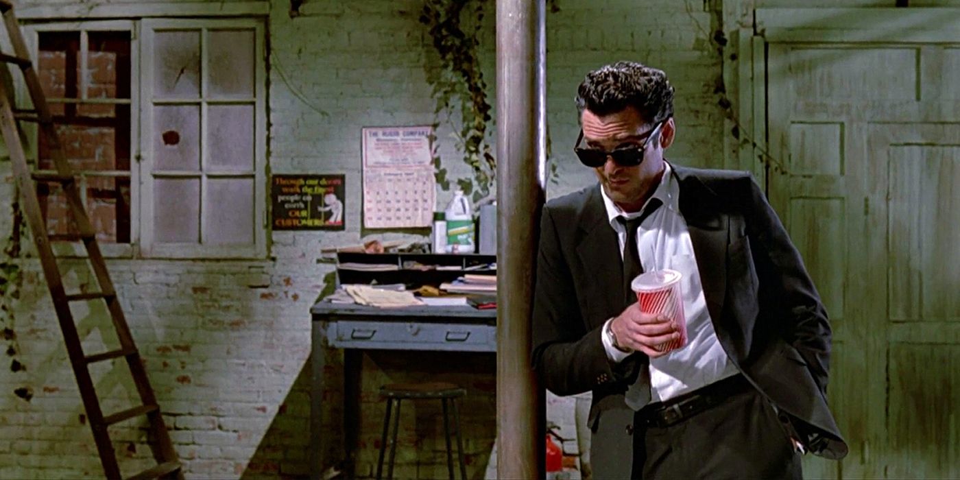 Michael Madsen leaning against a post in Reservoir Dogs
