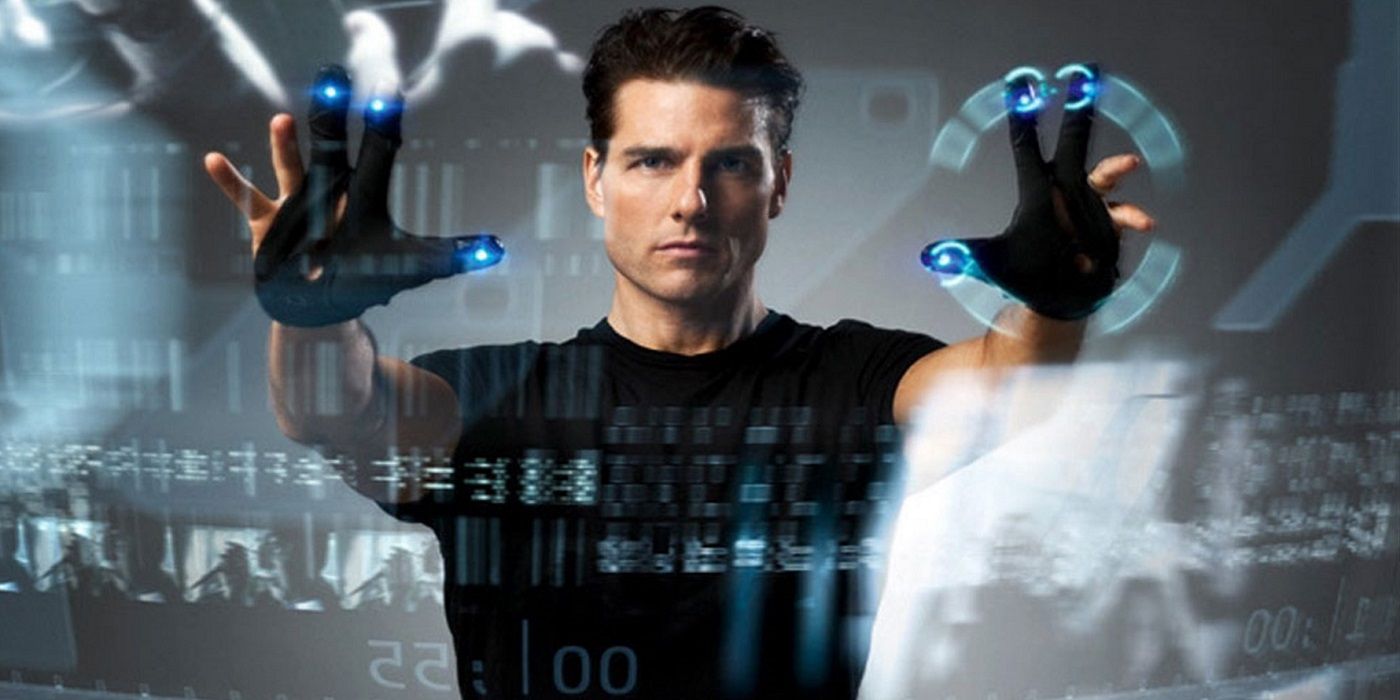 Tom Cruise moving images with his gloves in Minority Report and looking at the camera